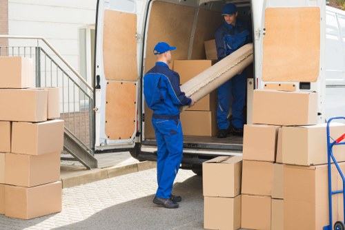 Removal van loading boxes at a West Wimbledon home