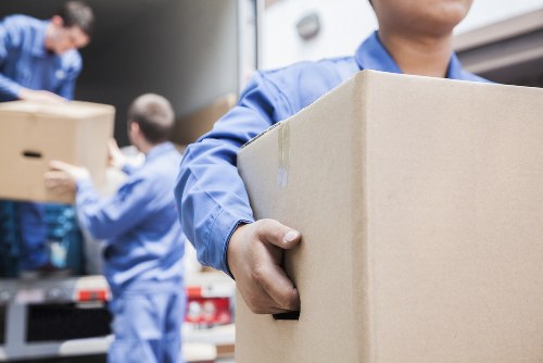 Local home moving service in Westwimbledon with boxes and furniture for a house relocation