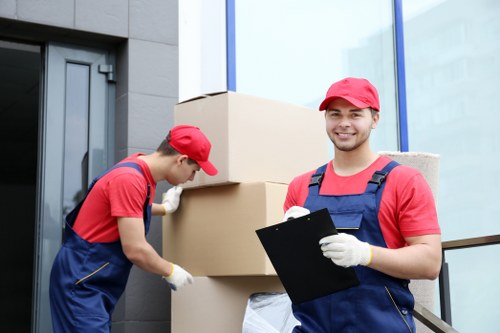 Careful loading of household boxes for removals in West Wimbledon