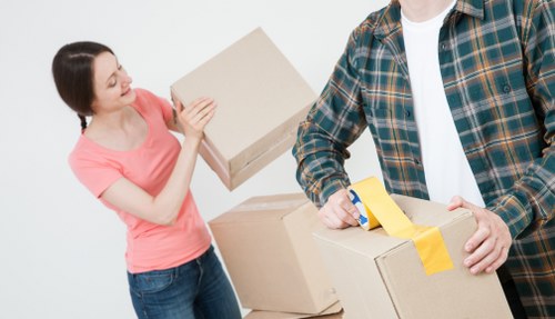 Household furniture and boxes being prepared for moving from a flat or house in Westwimbledon