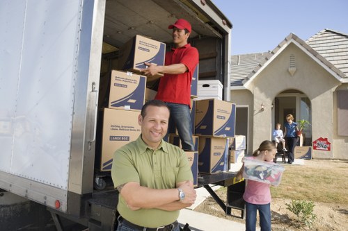 Team member reviewing safety procedures at the end of a removals operation