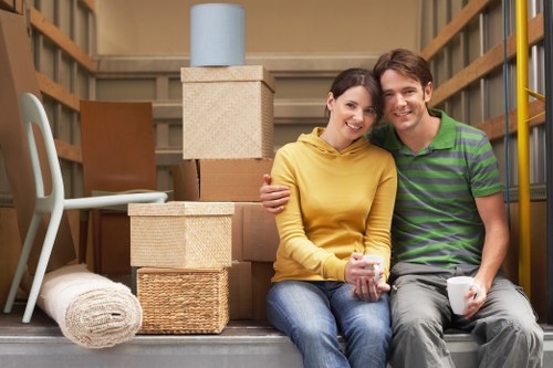 Loading furniture into a removal van for a West Wimbledon house move