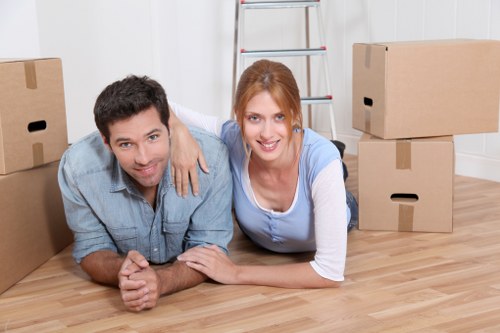 Van-based moving service assisting with furniture delivery in Westwimbledon