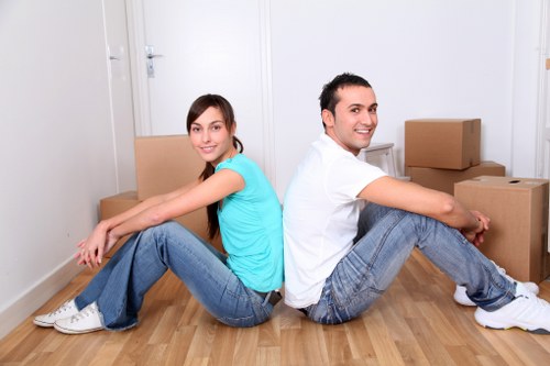 Professional local removals team handling furniture during a home move in Westwimbledon