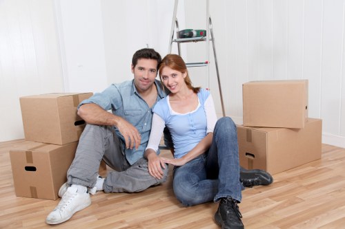 Removal team handling household items during a scheduled move