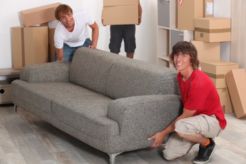 Local movers organising boxes for a West Wimbledon property relocation