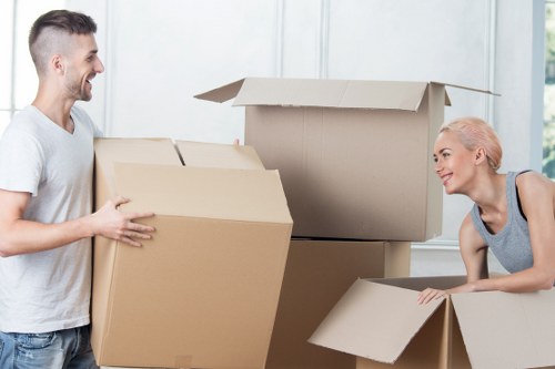Loading furniture into a removal truck for a local move