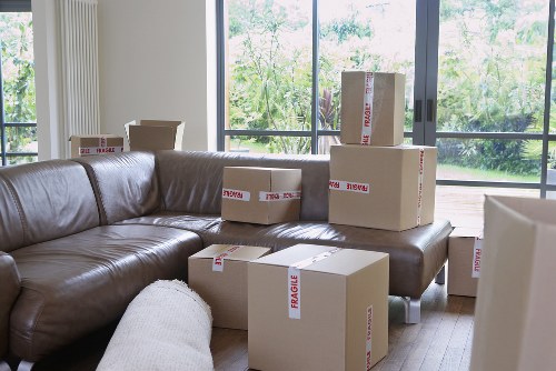 Local removals team planning access and parking for a Westwimbledon property